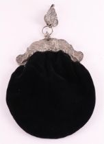 A silver contoured bag bracket on a black fabric bag and matching hook.