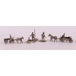 Etagere silver. Four various figures including hunter and horse and cart, 20th c