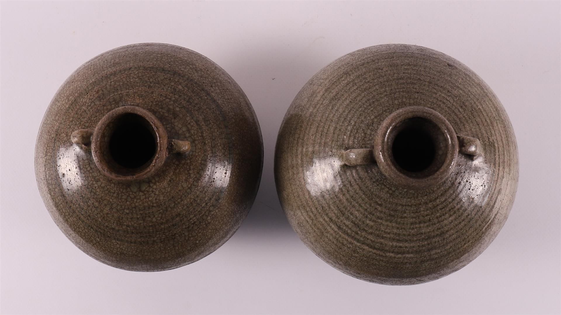 A pair of celadon glazed spherical vases with handles, China, Song Dynasty. - Image 3 of 4