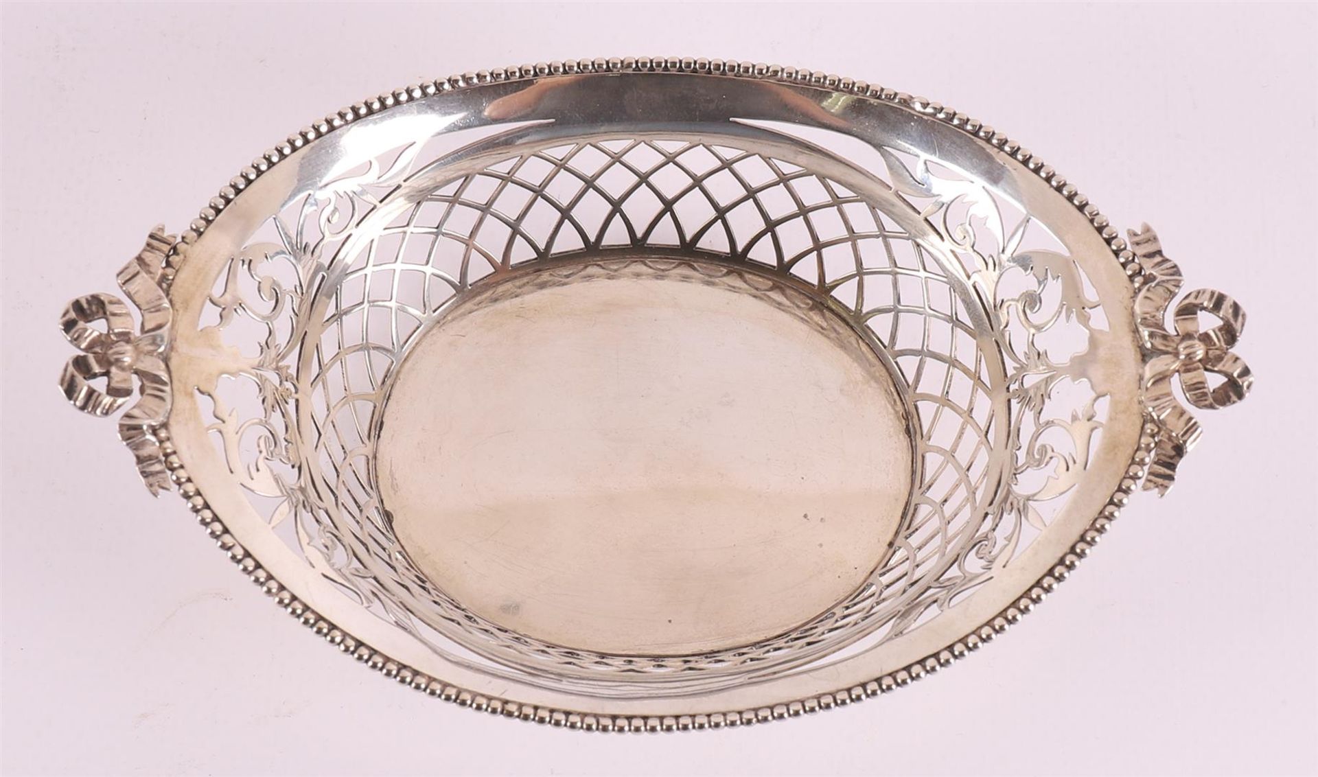 A silver openwork boat-shaped chocolate basket, year letter 1911. - Image 8 of 9