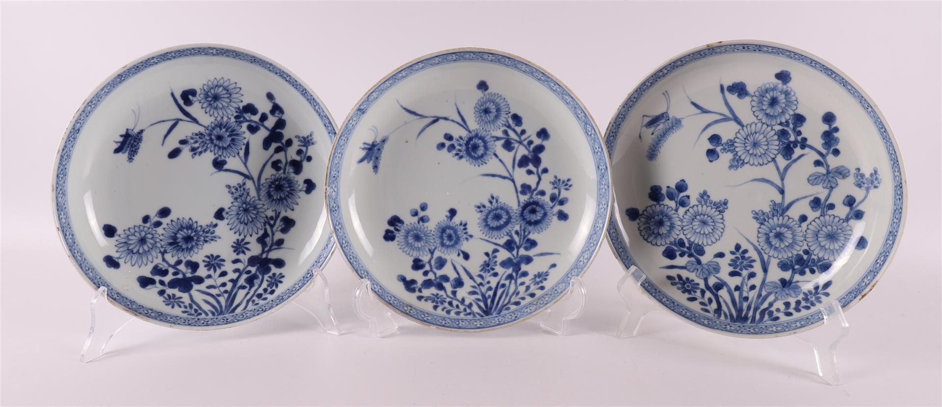 A series of three blue/white porcelain plates, China, Qianlong, 18th century.