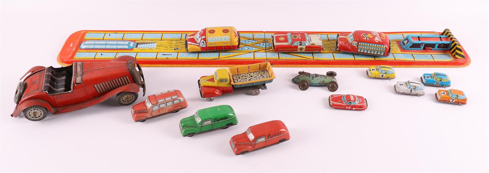 A lot of various tin toy cars and motorways, 2nd half of the 20th century