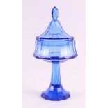 A blue glass faceted Art Deco lidded coupe on a high foot, Moser Karlsbad