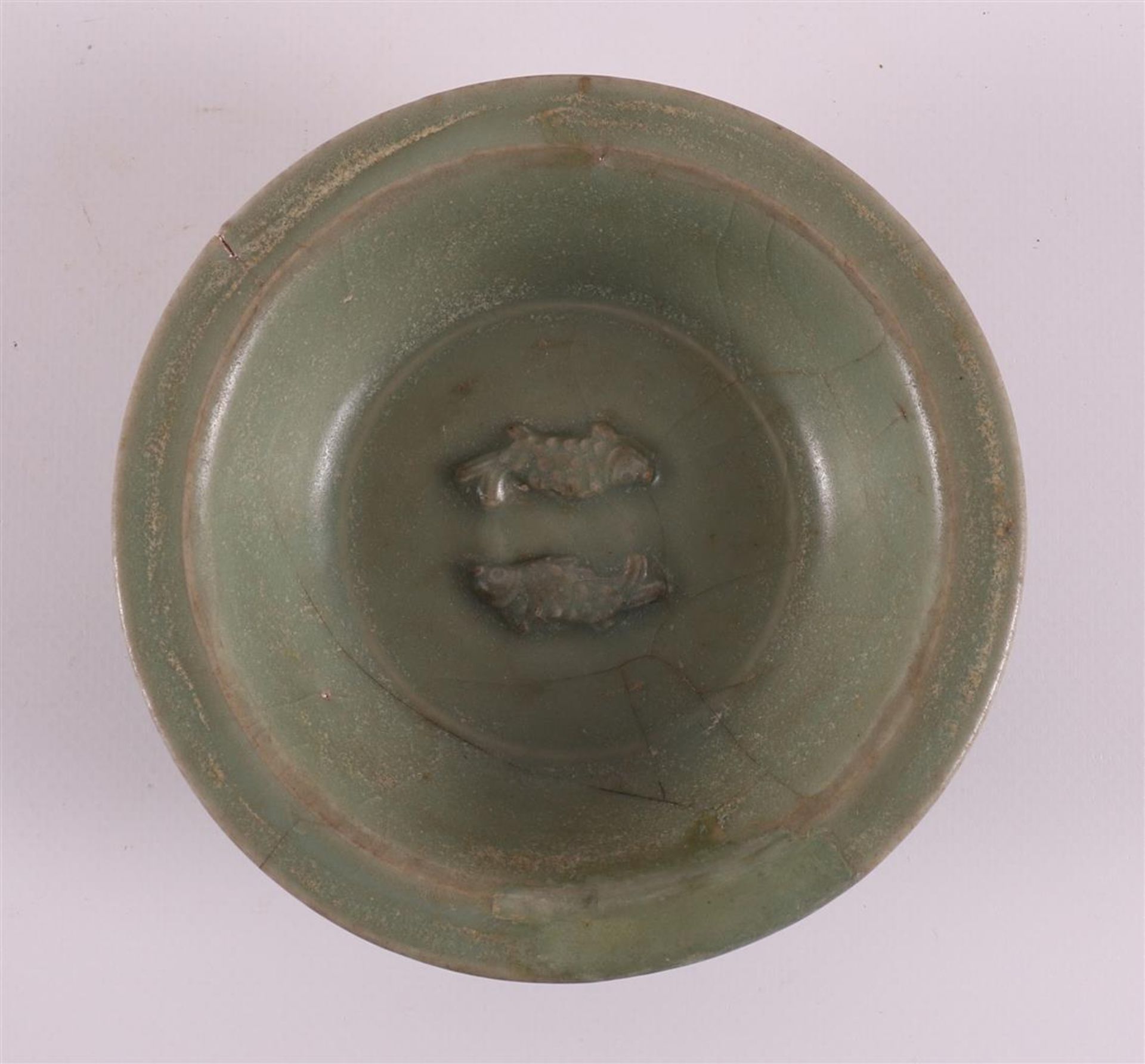 A green glazed celadon bowl with relief decoration of two fish, China, - Image 2 of 3