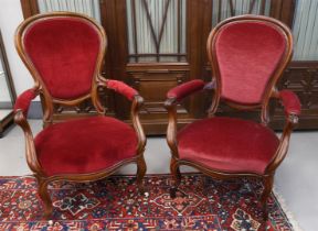 A pair of mahogany voltaires, late Biedermeier, 19th century.