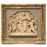 A Mechelen carved alabaster relief representing Charity