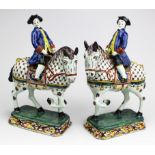 A pair of Delft polychrome pottery horse riders