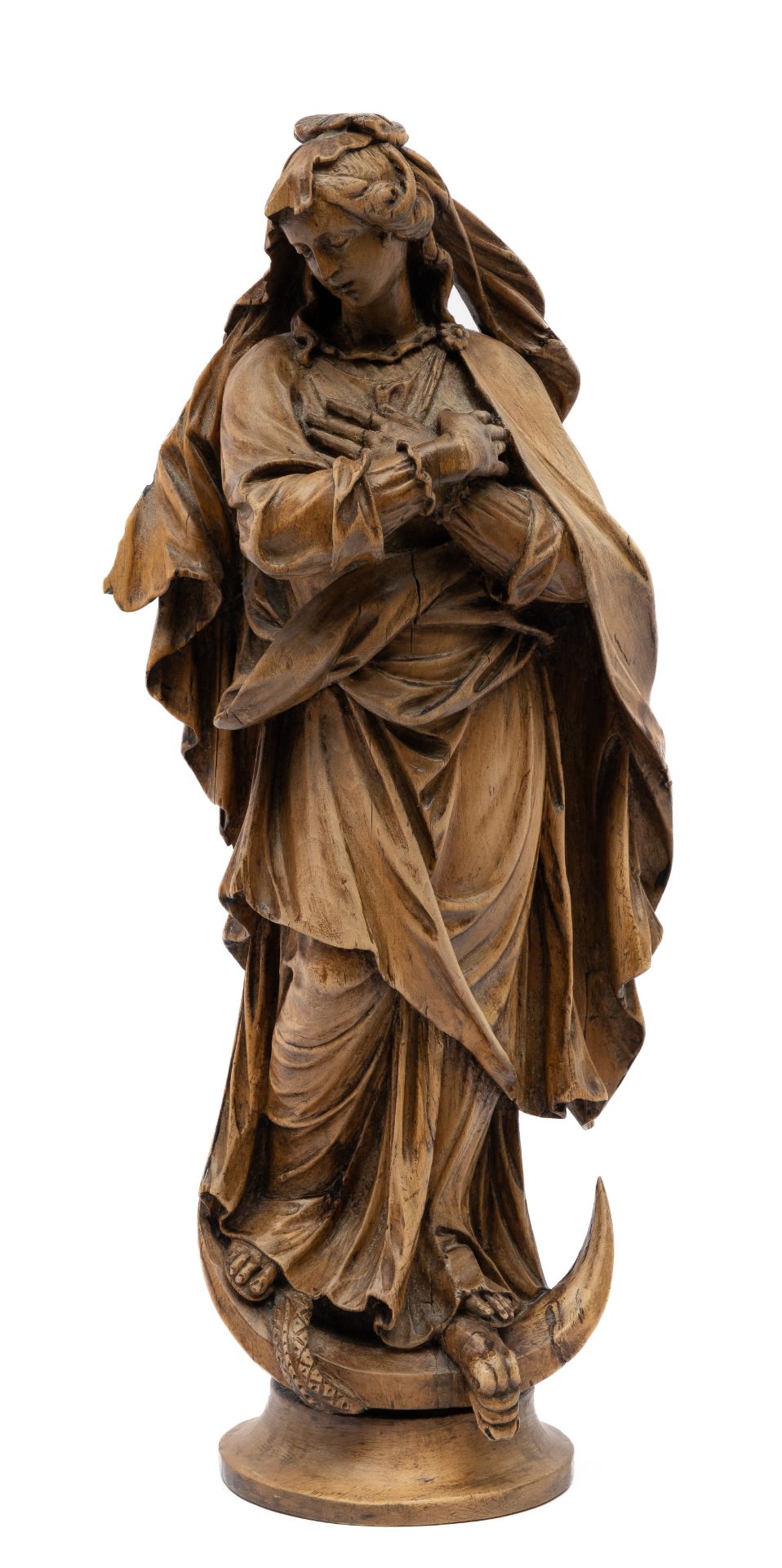 A carved limewood figure of the Virgin Mary