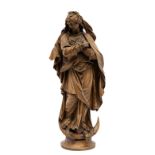 A carved limewood figure of the Virgin Mary