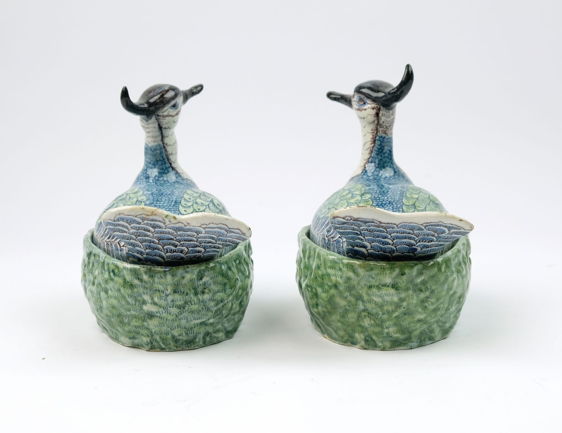 A pair of Delft polychrome pottery lapwing covered dishes - Image 5 of 7