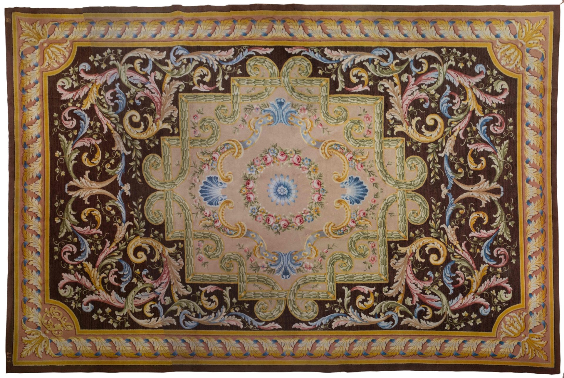 A large Spanish wool rug, from the Royal Tapestry Factory (Real Fábrica de Tapices)