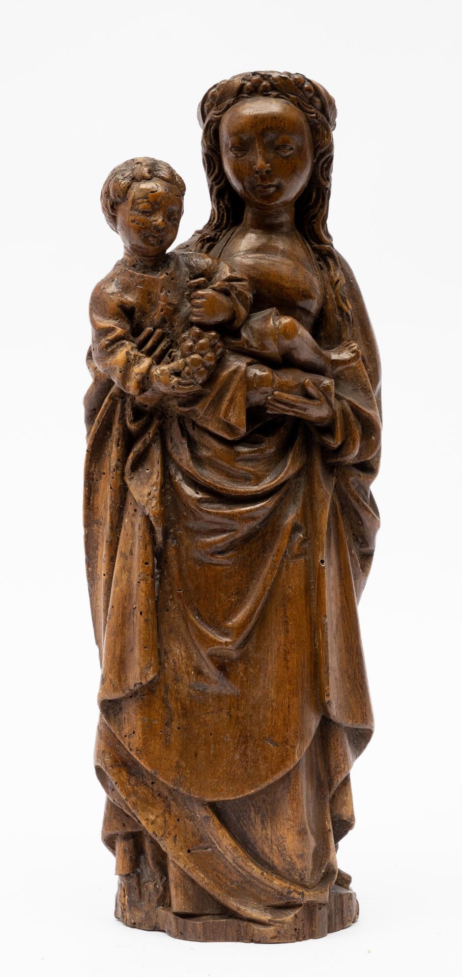 A Mechelen carved walnut group of the Virgin and Child