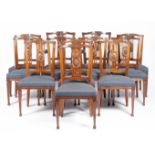 A set of twelve Dutch carved mahogany dining chairs