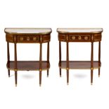 A pair of Louis XVI ormolu-mounted mahogany console dessertes