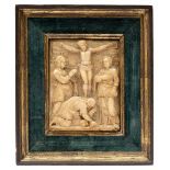 A Mechelen carved alabaster relief of the crucifixion