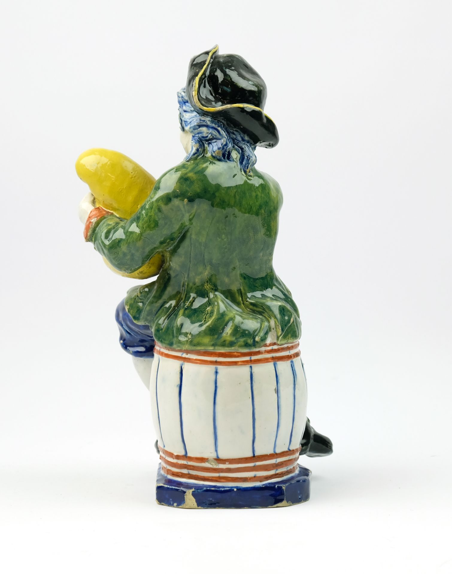 A large Delft polychrome pottery figure of a bagpipe player - Image 3 of 7