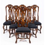 Six Anglo-Dutch carved walnut chairs, in the manner of Thomas and Richard Roberts