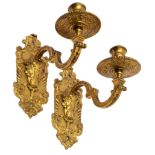 A pair of Régence ormolu single-branch wall lights