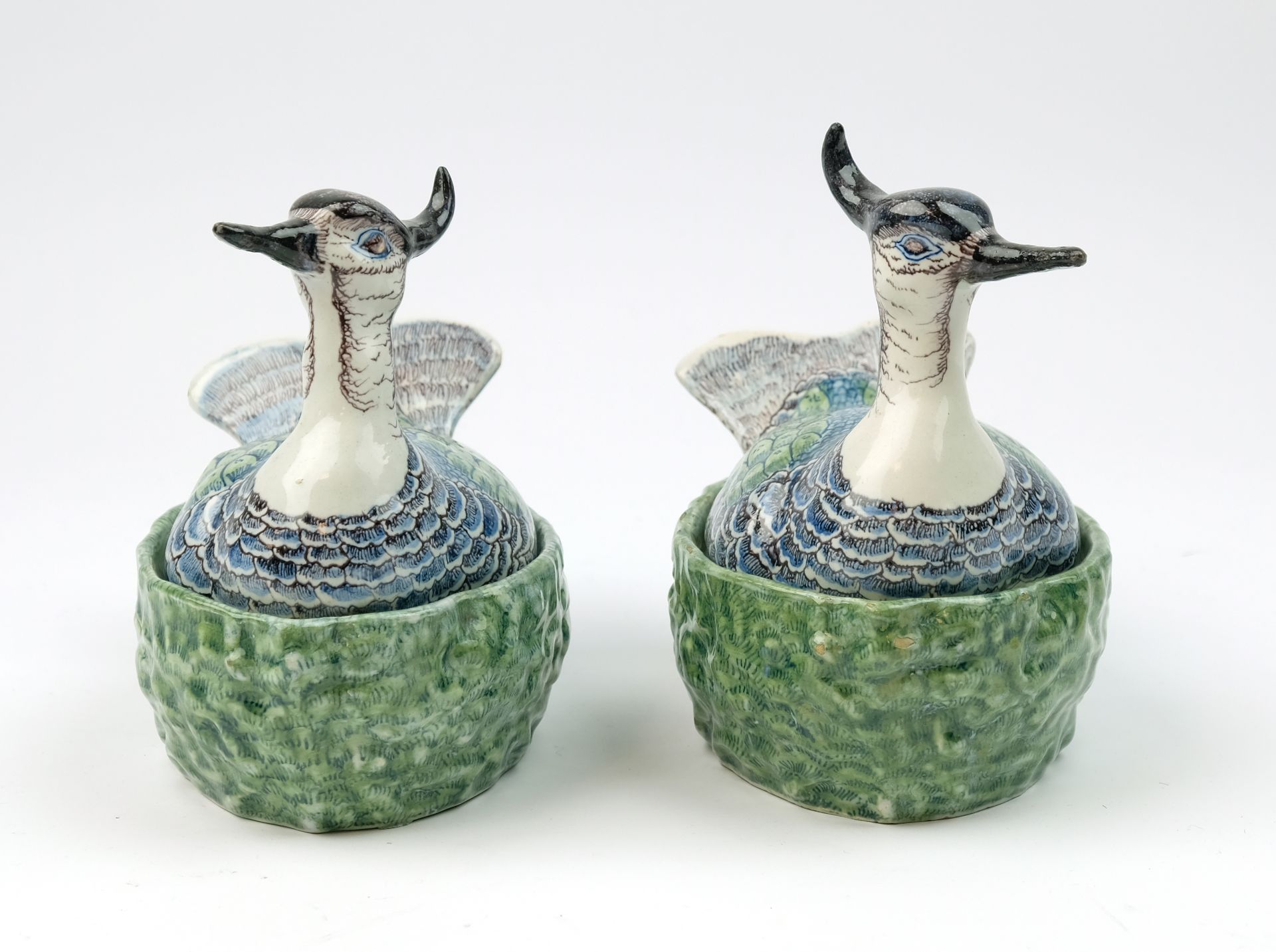 A pair of Delft polychrome pottery lapwing covered dishes - Image 3 of 7