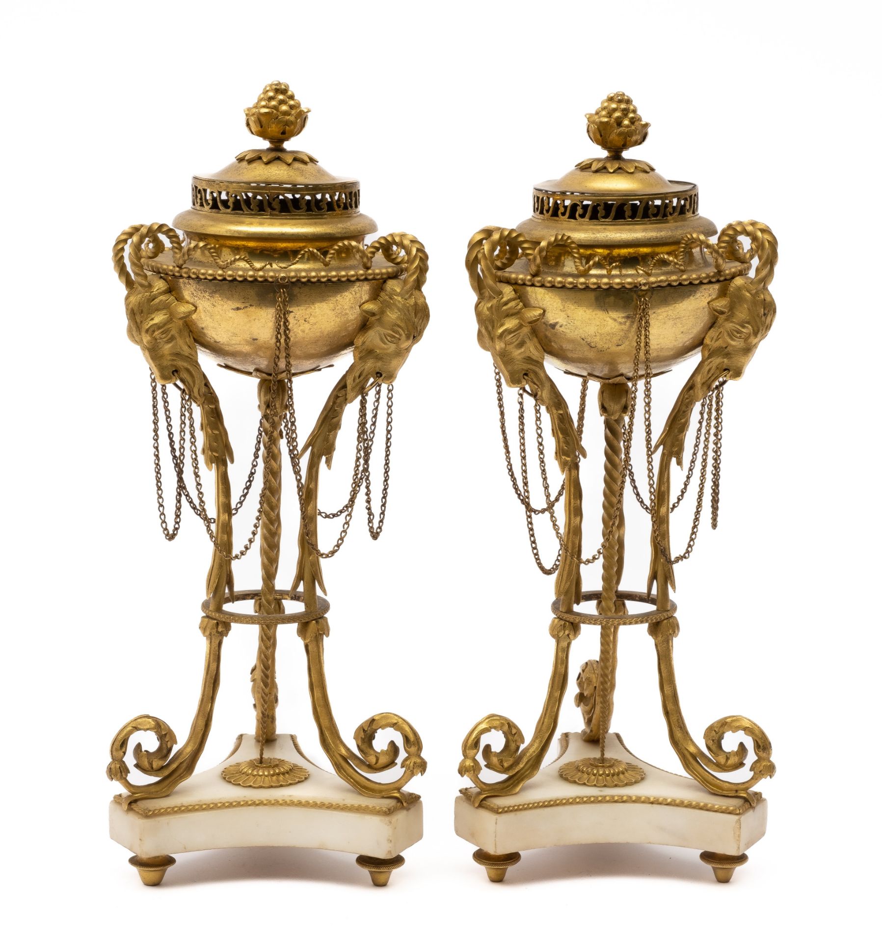 A pair of Louis XVI ormolu and white marble brûle parfums