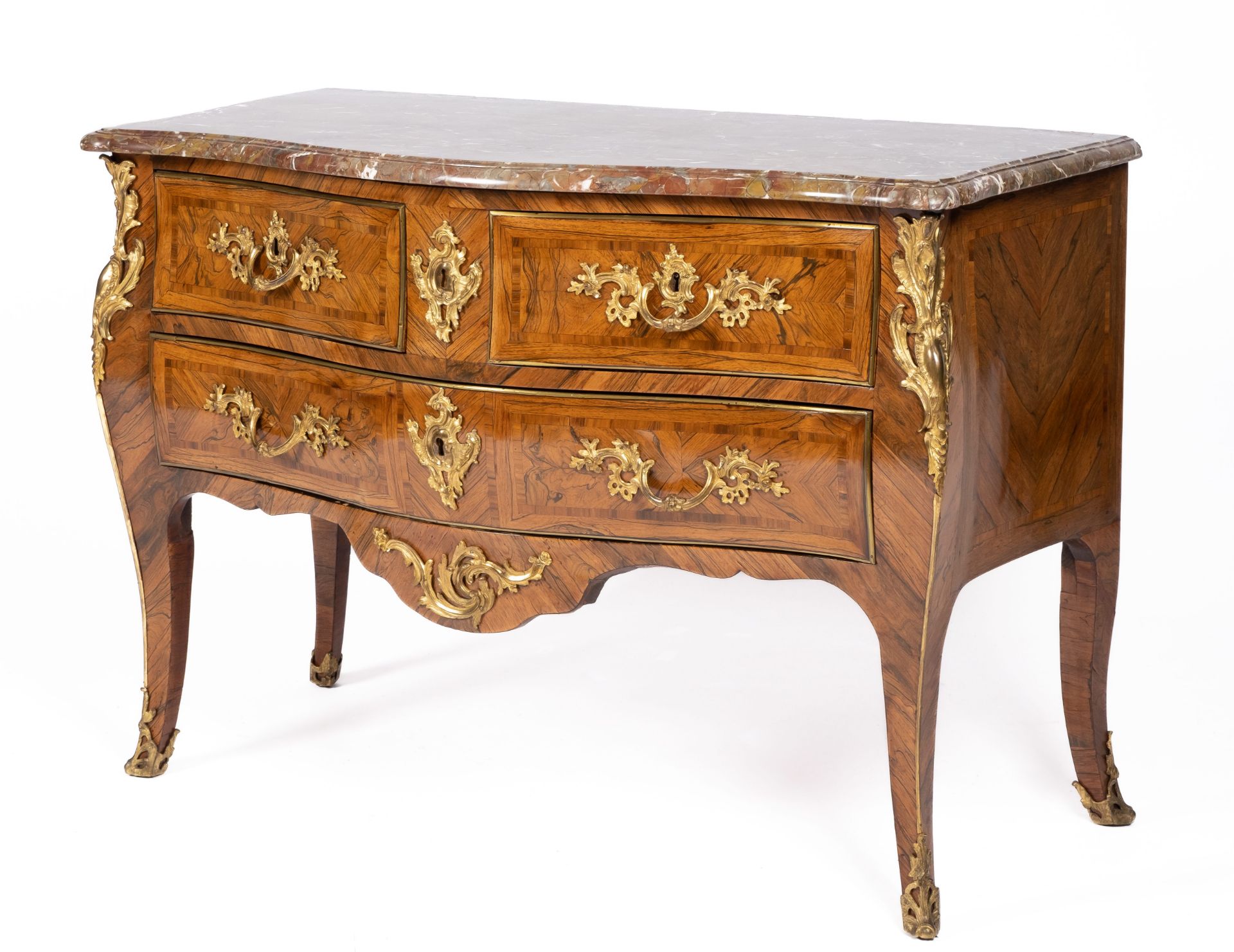A Louis XV ormolu-mounted kingwood and fruitwood marquetry commode