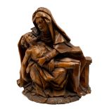 A carved limewood group of the Pieta, probably South German