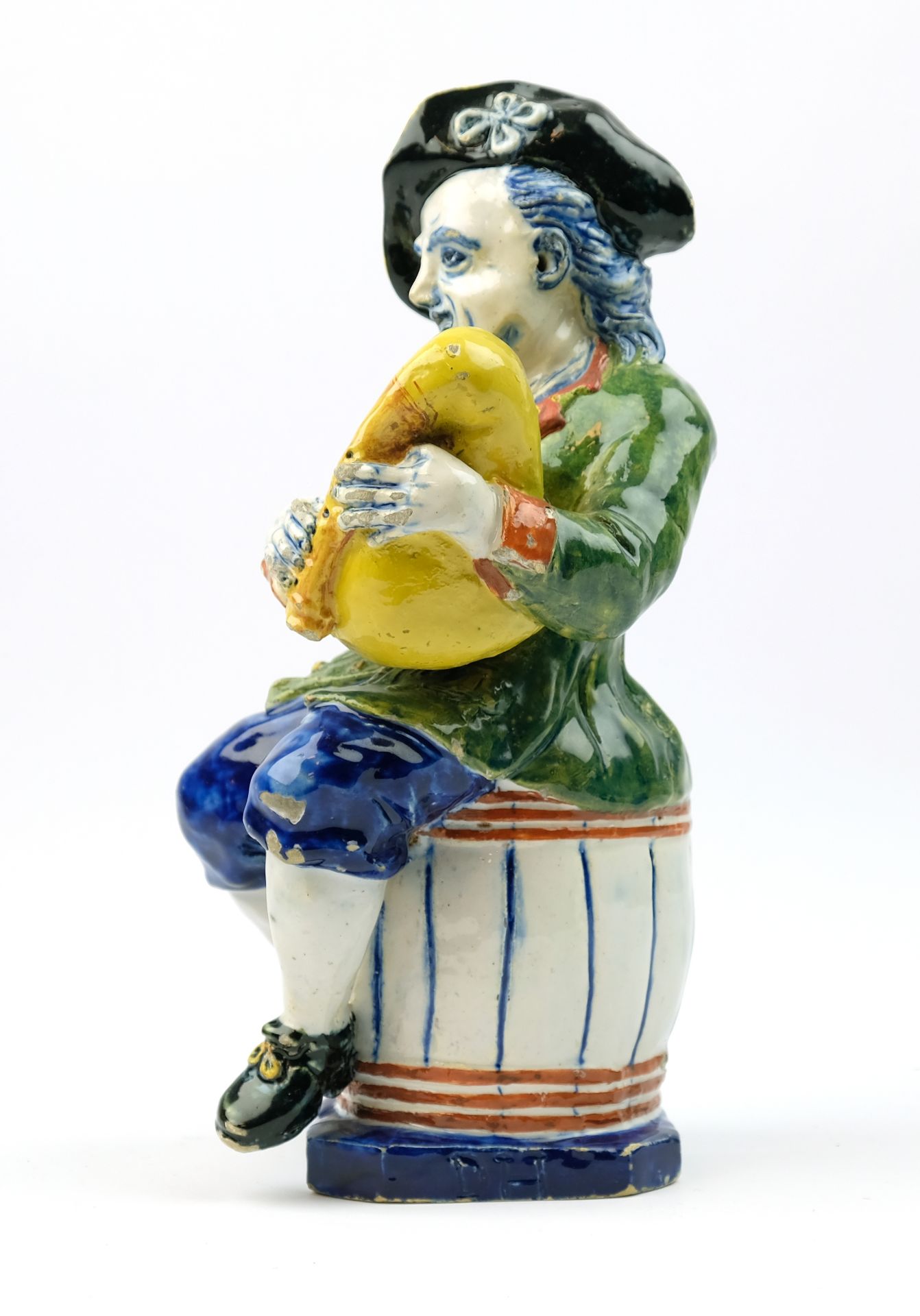 A large Delft polychrome pottery figure of a bagpipe player - Image 2 of 7