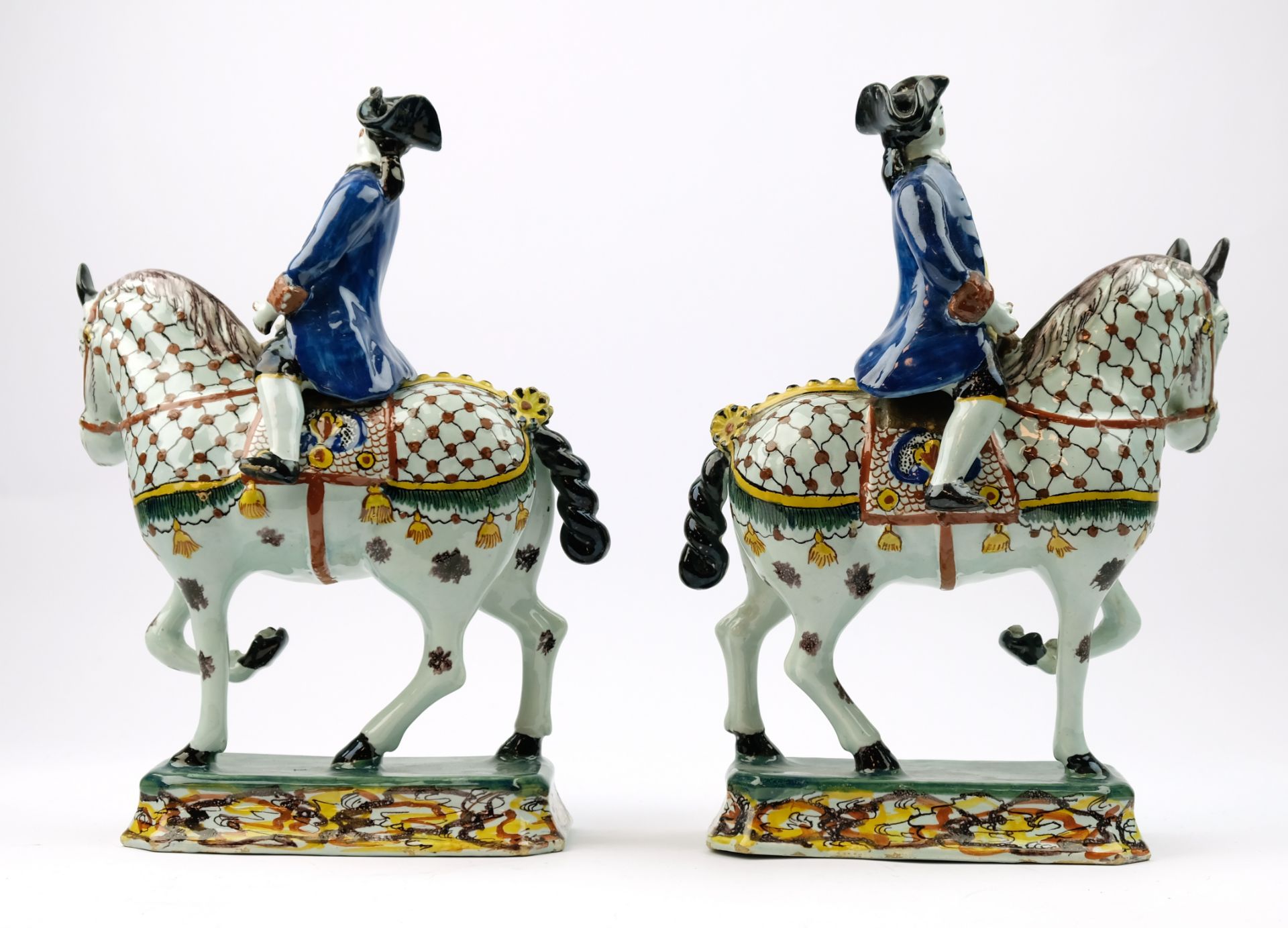 A pair of Delft polychrome pottery horse riders - Image 5 of 8
