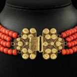 A Four Strand Red Coral Necklace