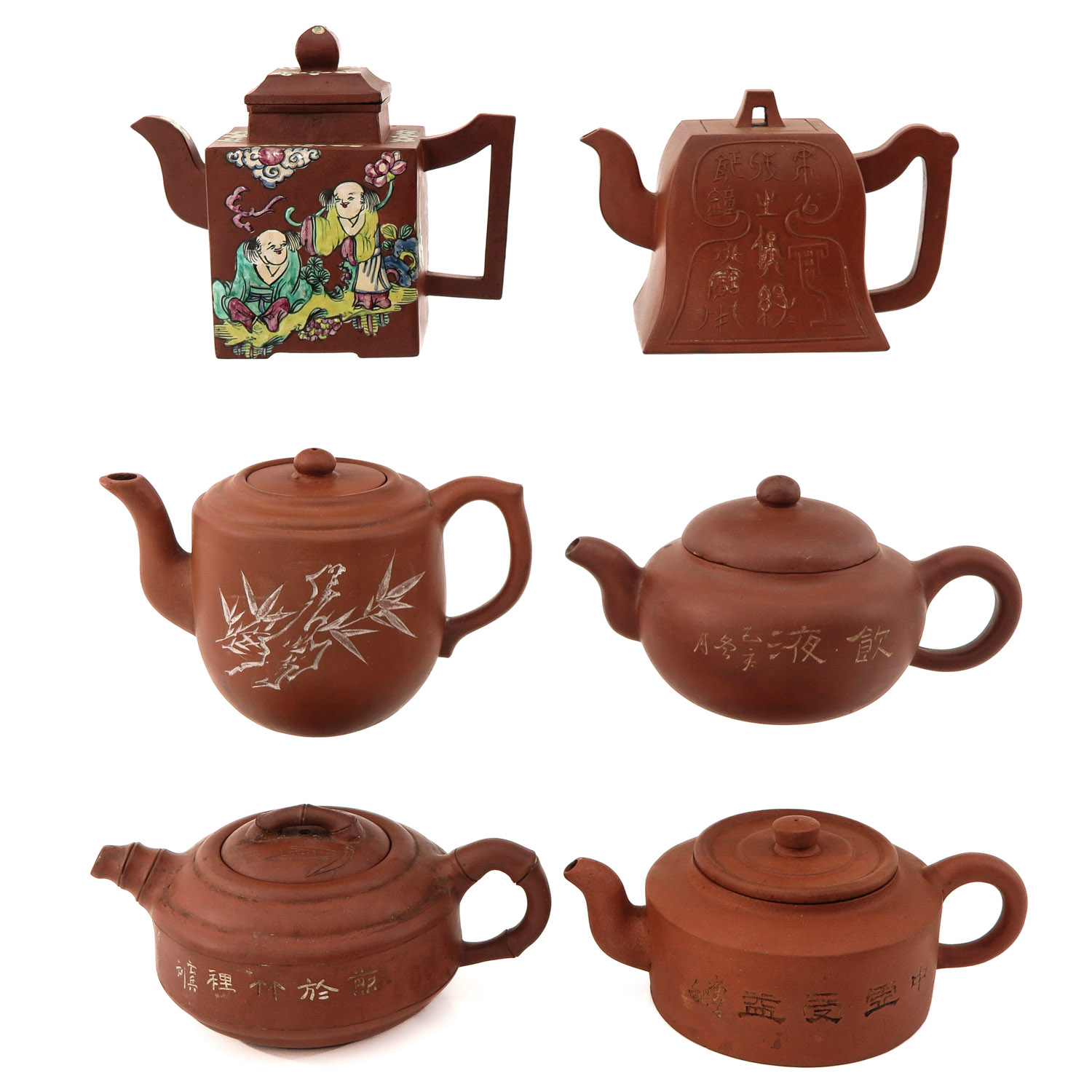 A Collection of 6 Yixing Teapots