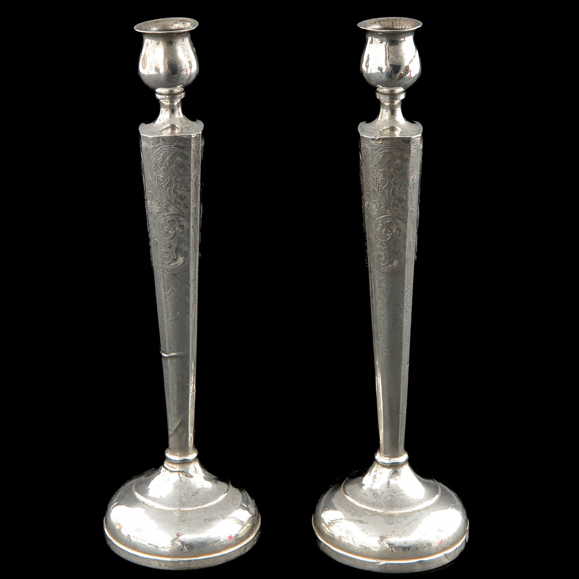 A Pair of Sterling Silver Candlesticks