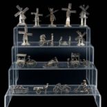 A Collection of 16 Silver Miniatures