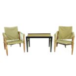 A Wilhelm Kienzle Design Coffee Table and Pair of Arm Chairs