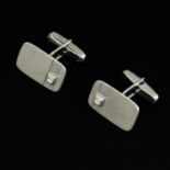 A Pair of 9KG Cuff Links Set with Diamonds