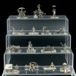 A Collection of 15 Silver Miniatures