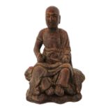 A Carved Wood Buddha