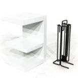 A Table and Metal Fireplace Set