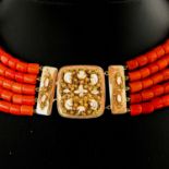 A Five Strand Red Coral Necklace on 14KG Clasp