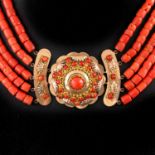 A Five Strand Red Coral Necklace on 14KG Clasp