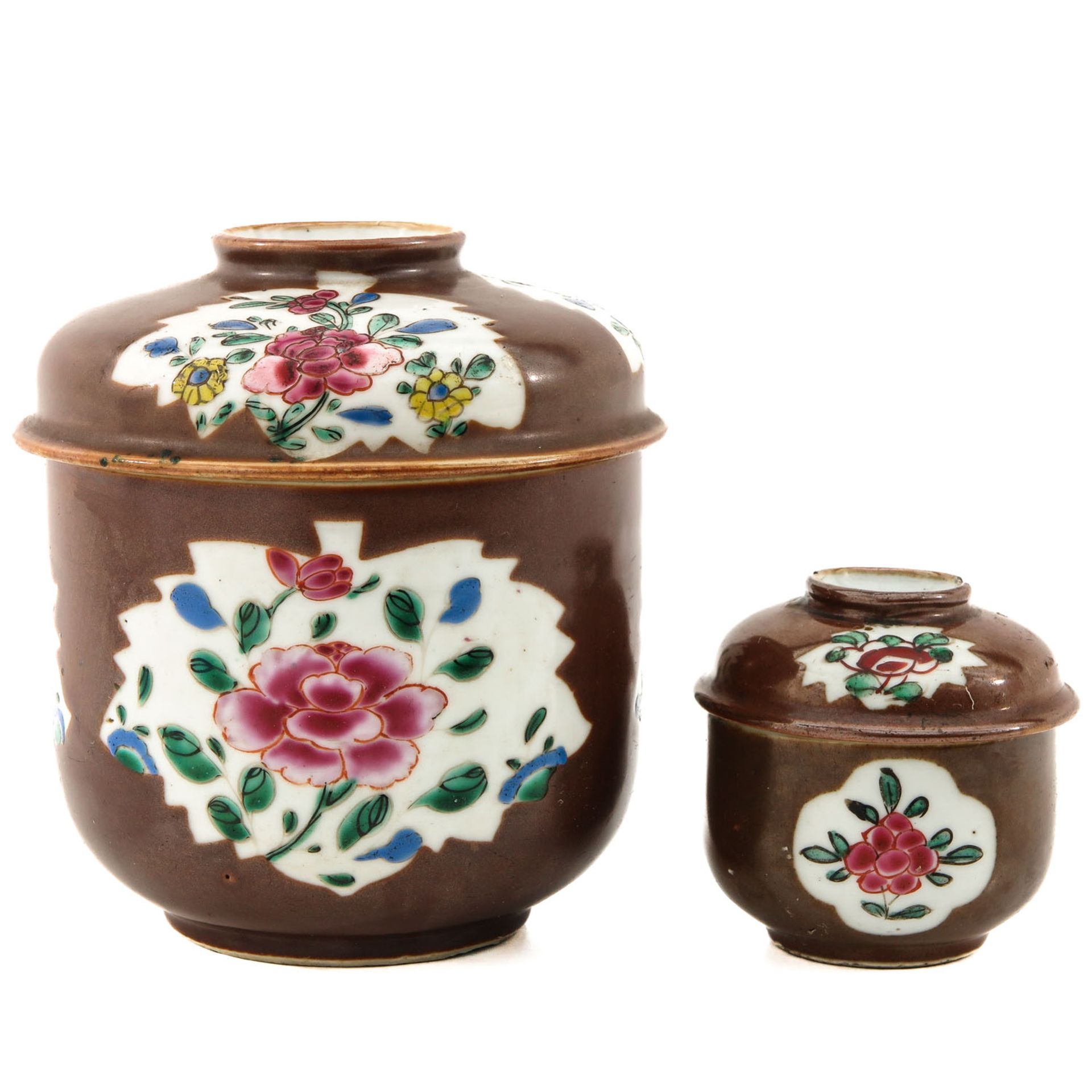 A Set of 2 Batavianware Jars with Covers