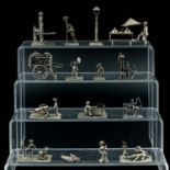 A Collection of 15 Silver Miniatures