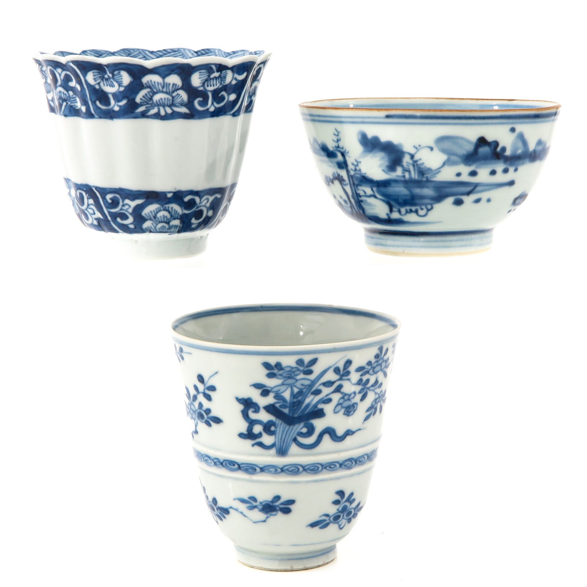 A Collection of 3 Blue and White Cups