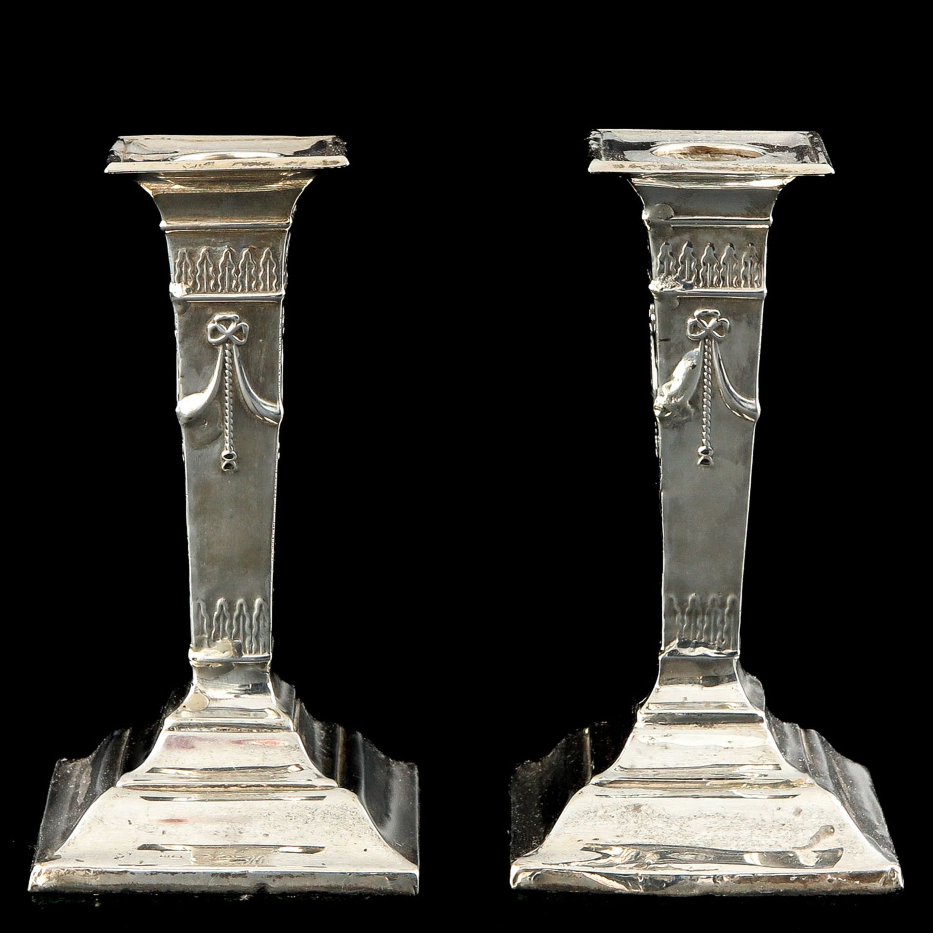 A Pair of Silver Candlesticks