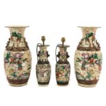 A Collection of Nanking Vases and Lamps