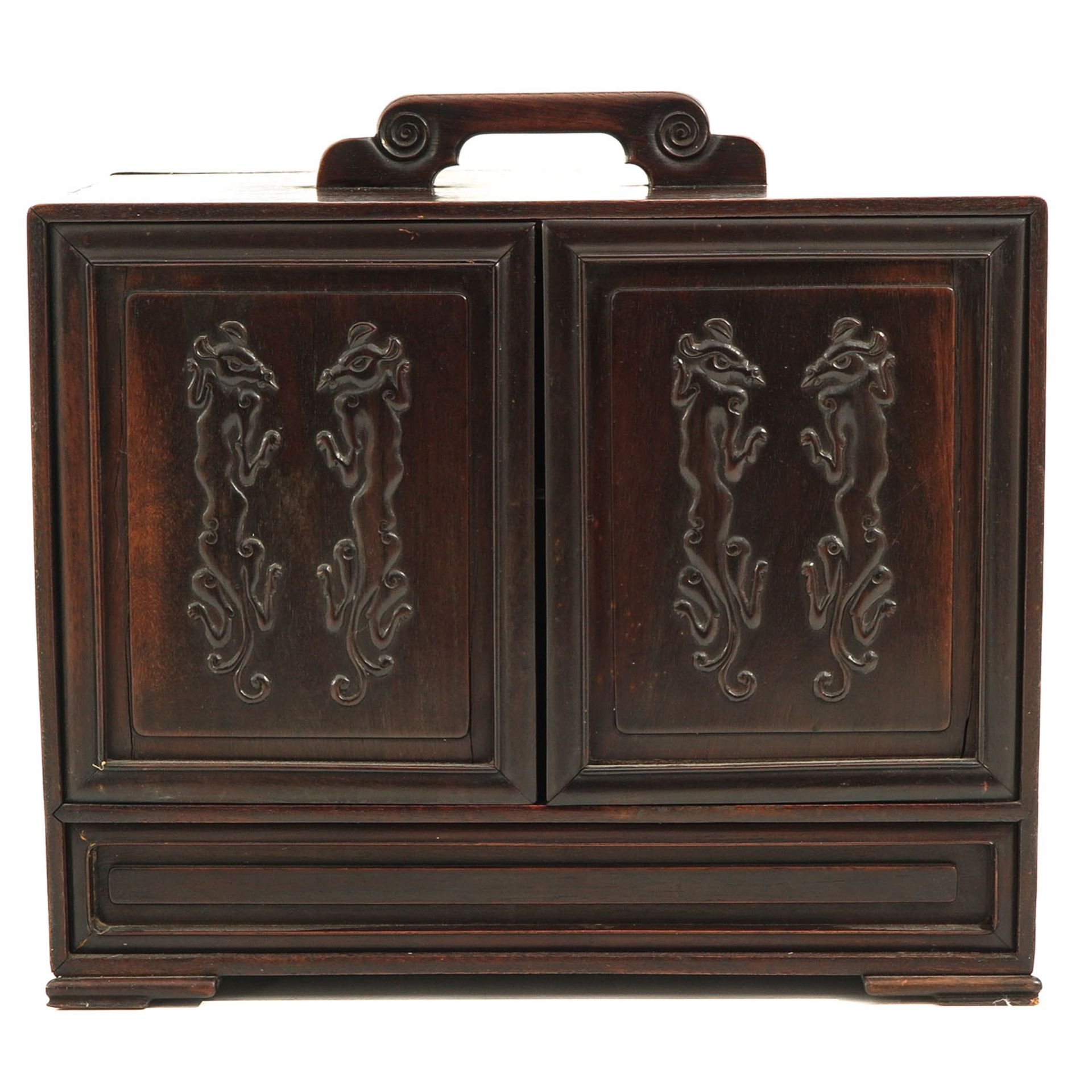 A Chinese Carved Wood Cabinet