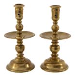 A Pair of Copper Candlesticks