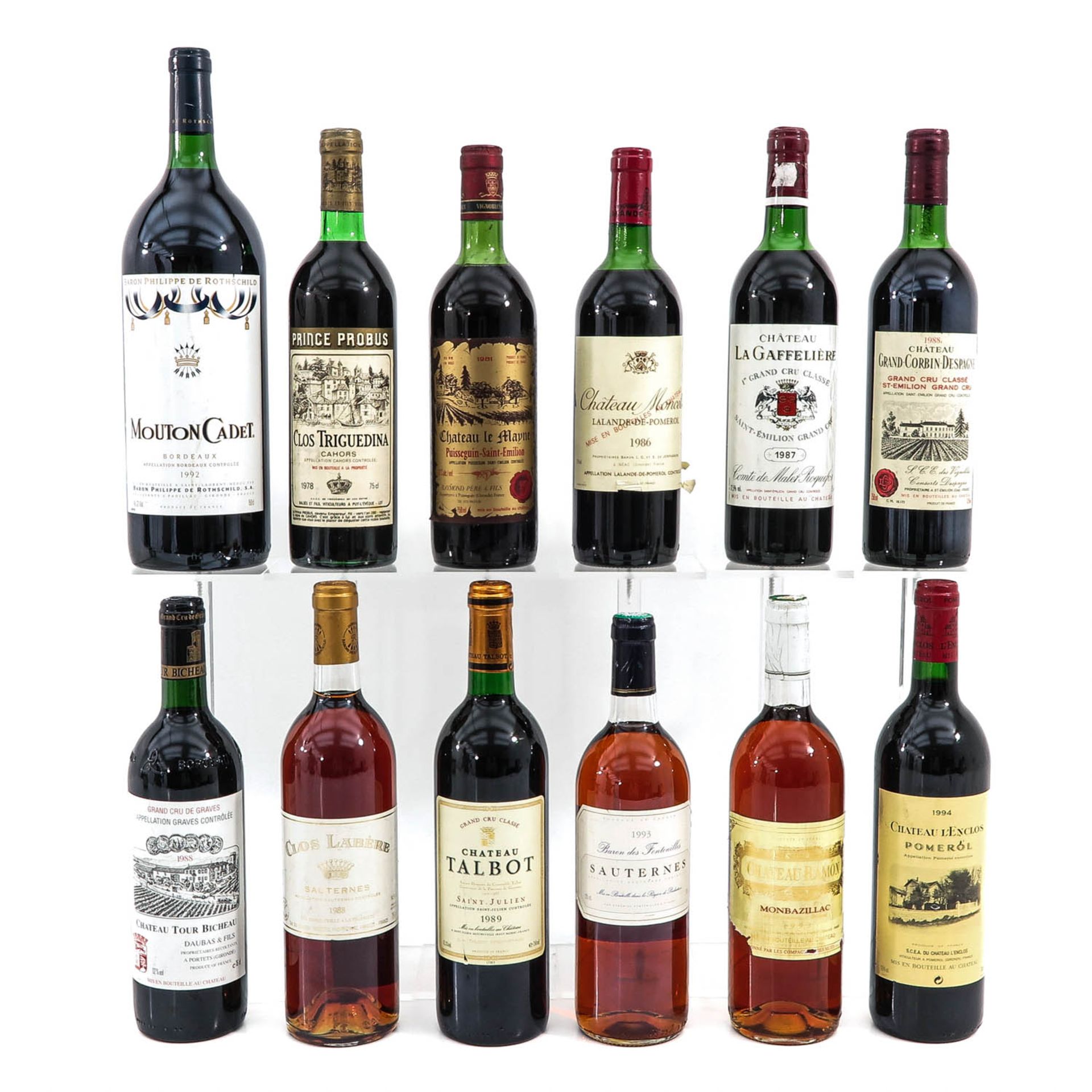 A Collection of 12 Wine Bottles