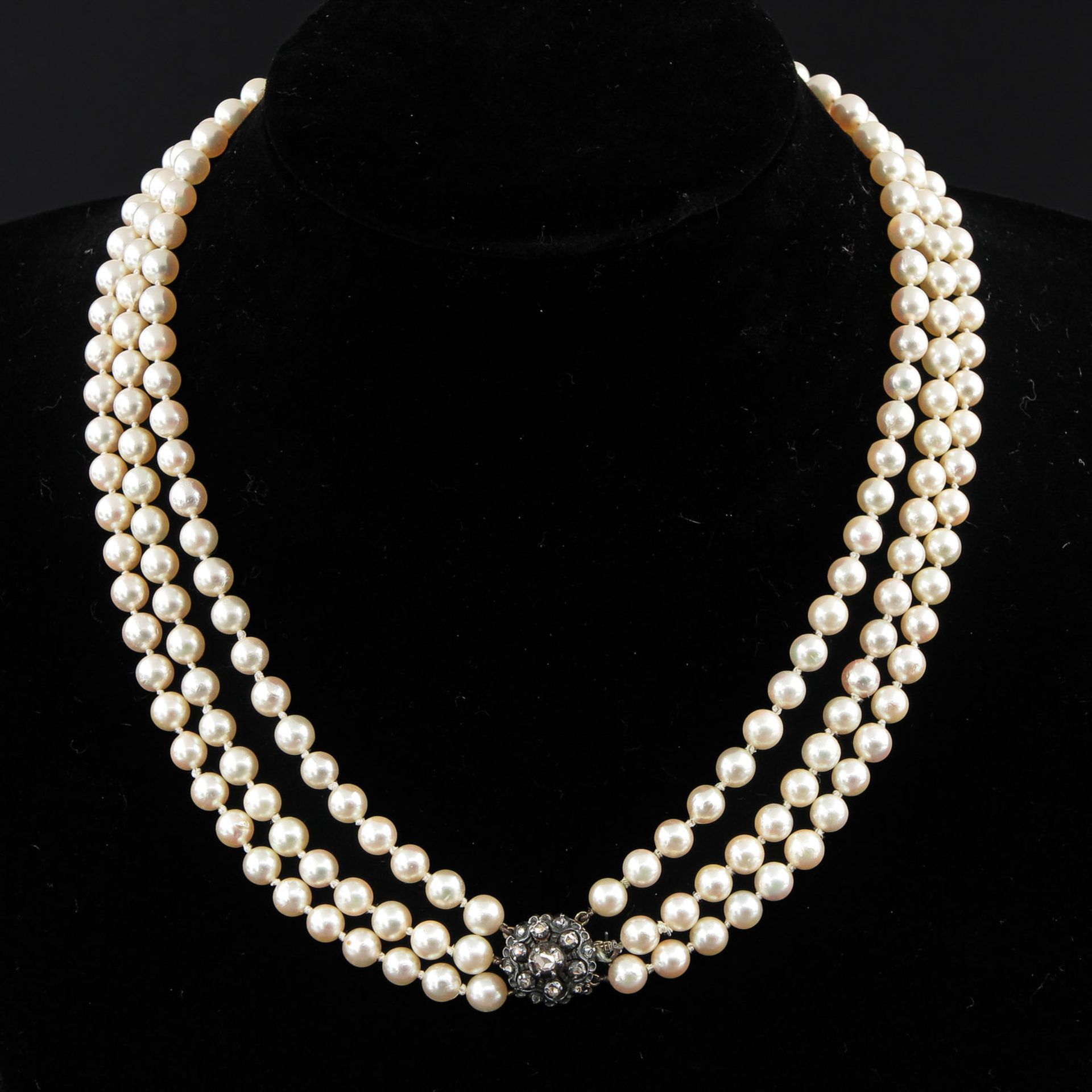 A 3 Strand Pearl Necklace on Silver and Gold Clasp