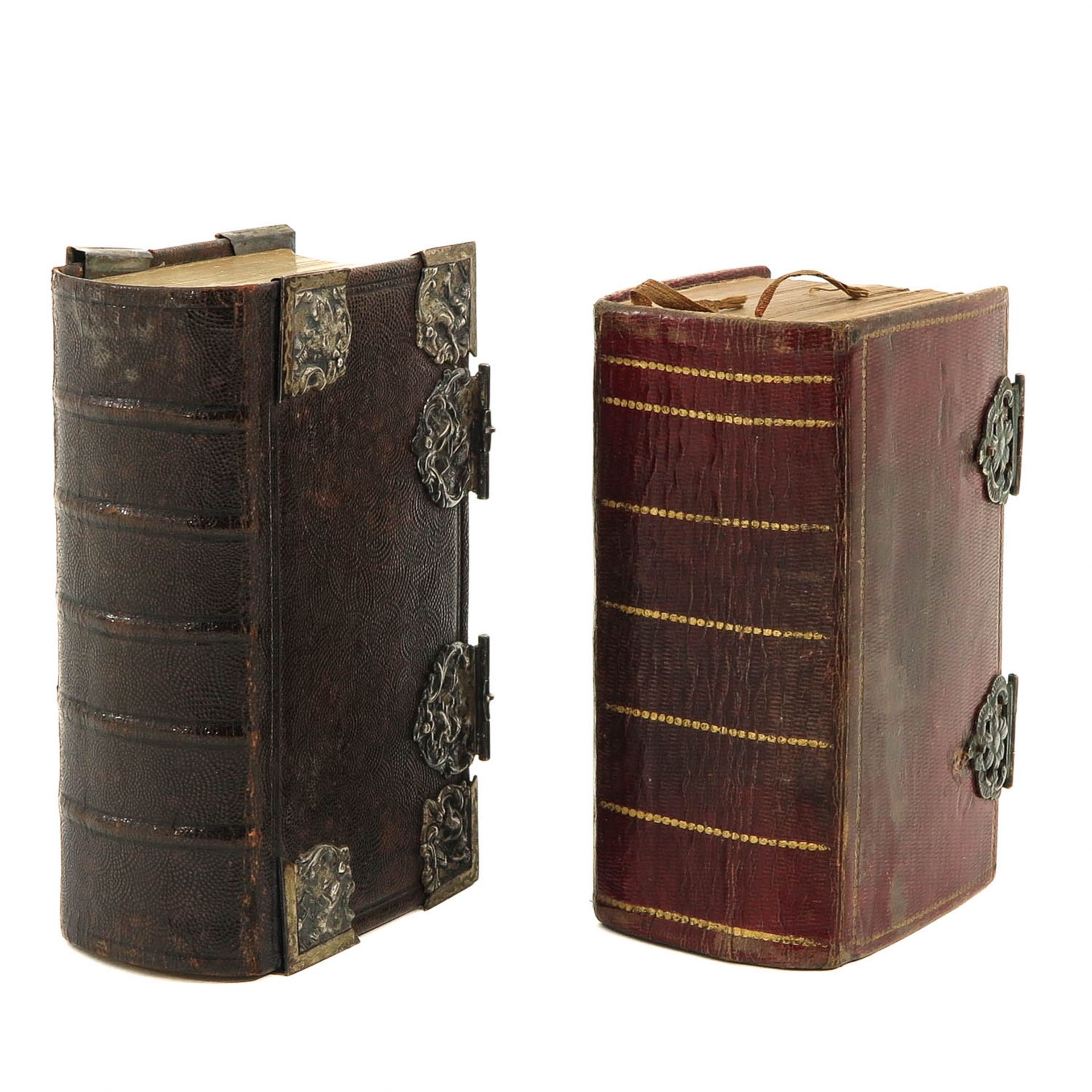 A Lot of 2 Bibles with silver Clasps