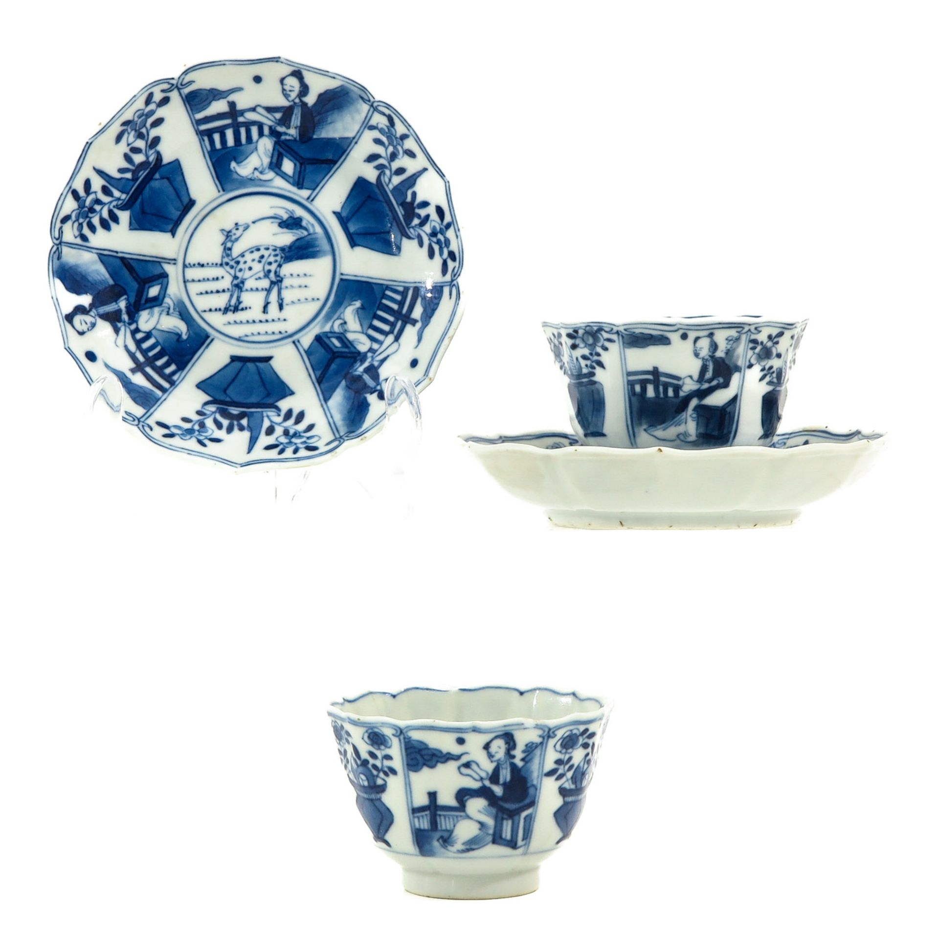A Pair of Blue and White Cups and Saucers